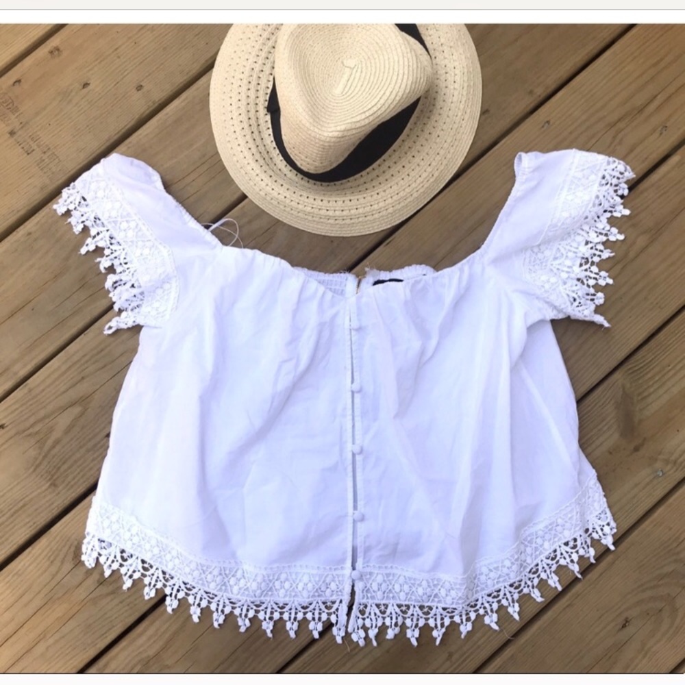 Gorgeous white top to pair with cutoffs!!